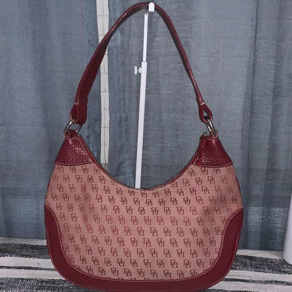 Dooney and Bourke authentic shoulder bag (burgundy color)